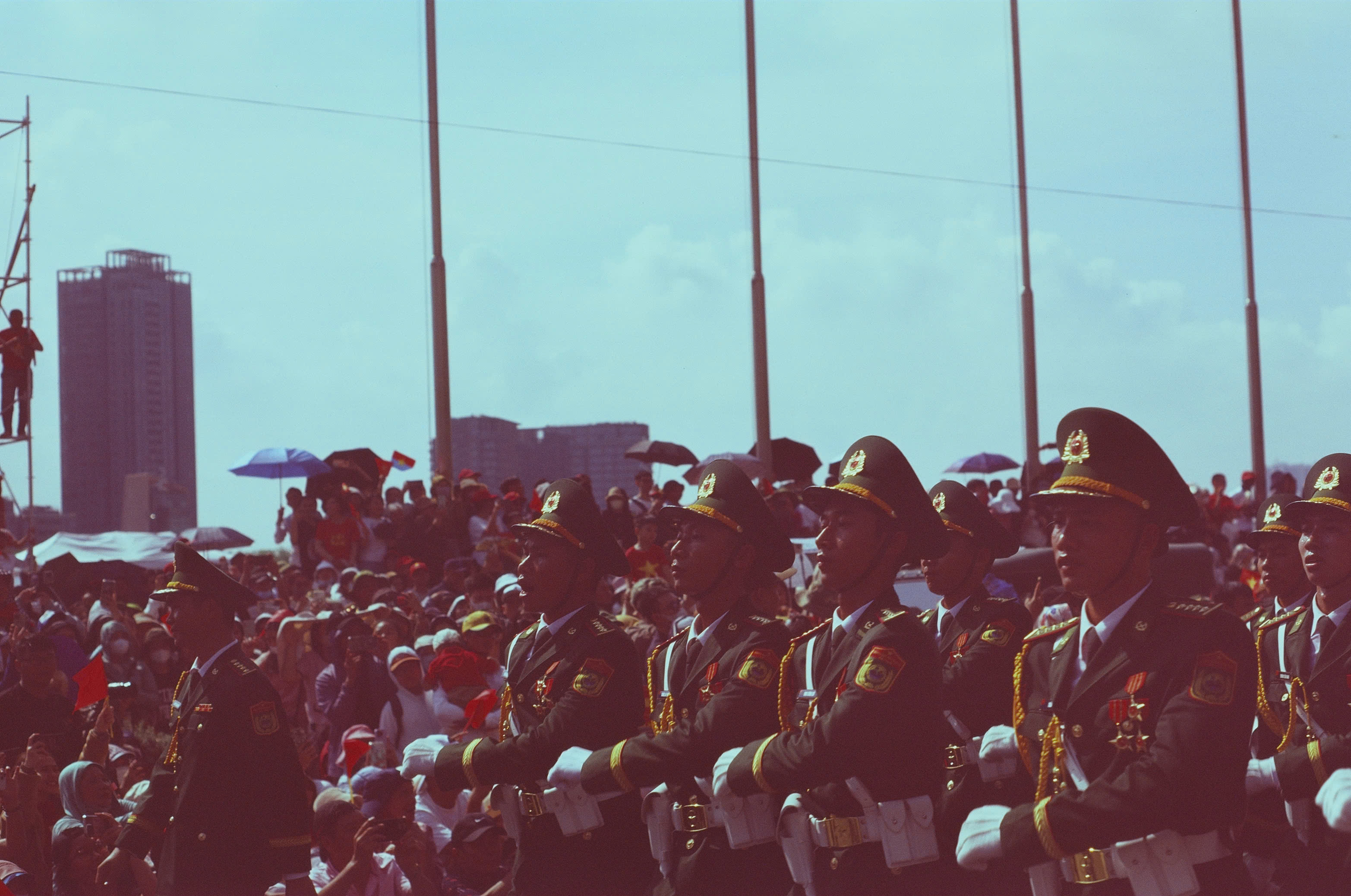 Vietnamese soldiers marching through a crowd during the April 27 full-dress rehearsal
